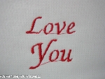 Wyhaftowałam napis „LOVE YOU“, który stworzyłam z alfabetu zapisanego w maszynie.